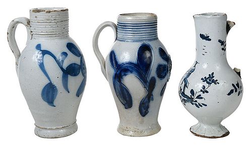 Three Blue and White Rhenish and Delft Jugs