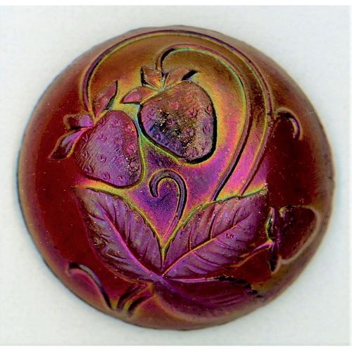 A MOLDED GLASS BUTTON OF STRAWBERRIES AND LEAVES