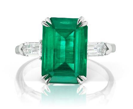 6.90ct Emerald And 0.72ct Diamond Ring