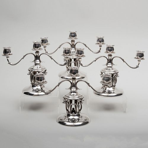 Set of Four American Silver Jensen Style Three-Light Candelabra