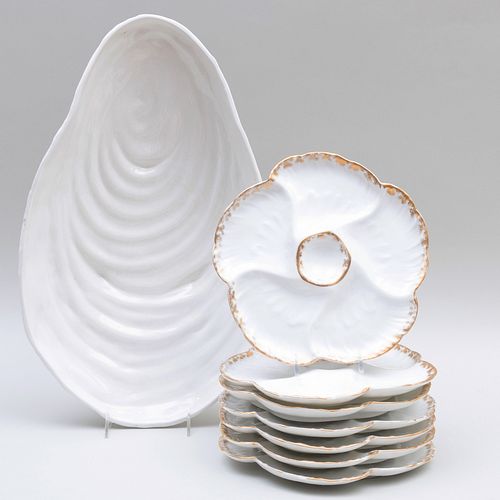Set of Limoges Gilt-Decorated Porcelain Oyster Plates and a Continental Oyster Serving Dish