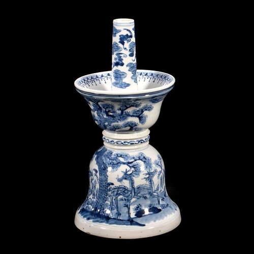 A 18th-/19th century blue and white candlestick holder