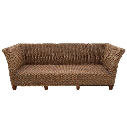 Loveseat. 20th century. Wicker and wood. Closed backrest.