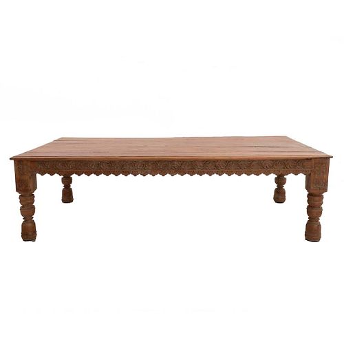 Coffee table. 20th century. Carved in wood. Raw finish. With rectangular top, compound shafts and smooth supports. 20.4 x 72 x 35.8" (52 x 183 x 91 cm
