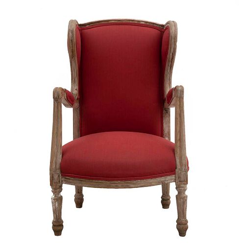 Bergere chair. 20th century. Carved in wood. Closed backrest, padded seat in red upholstery.