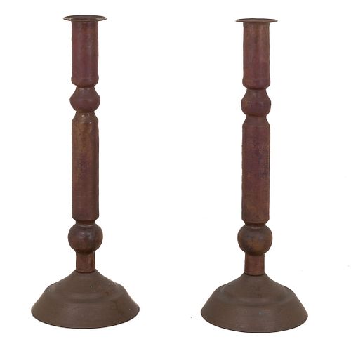 Pair of candlesticks. 20th century. Metal, circular washers, compound shafts, circular supports.