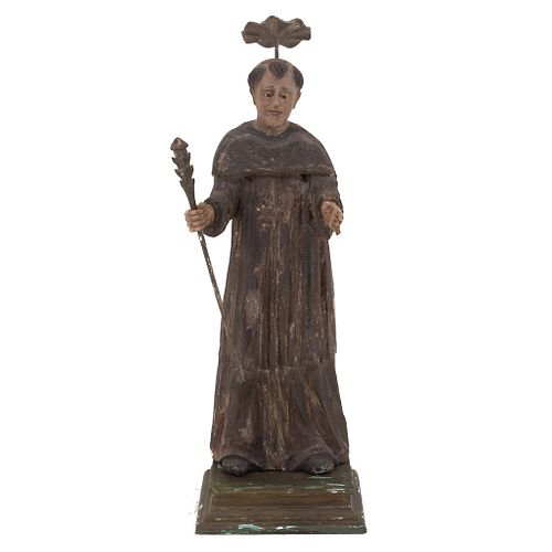 Martyred saint. Early 20th century. Polychrome wood, with base.