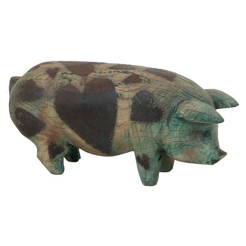 Pig. 20th century. Polychrome wood carving, metal applications in heart design.