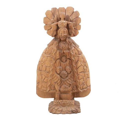 Ampona Virgin from Zapopan. 20th century. Wood carving, decorated with plant, floral, organic, and cross elements.
