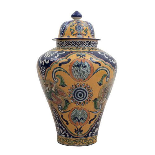 Tibor. Mexico. 20th century. Made in talavera. Decorated with plant, floral, organic elements, archangel.
