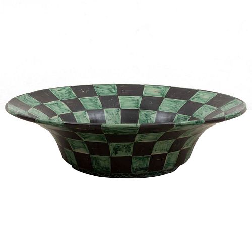 Centerpiece. 20th century. Polychrome ceramic. Decorated with geometric elements in manner of a green and black checkerboard.