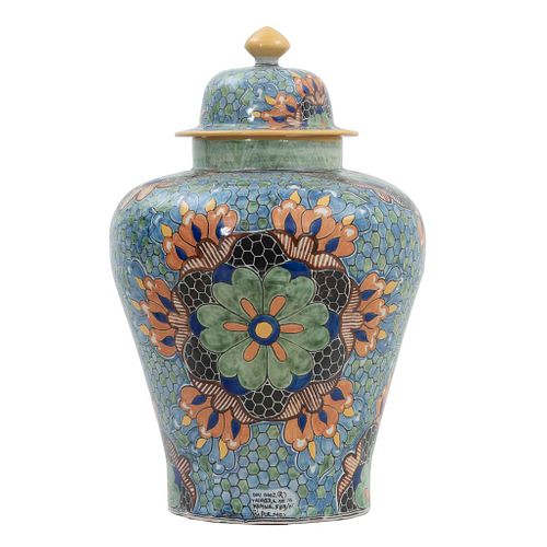 Tibor. Mexico. 20th century. Made in De la Reyna talavera. Decorated with plant, floral, and geometric elements.