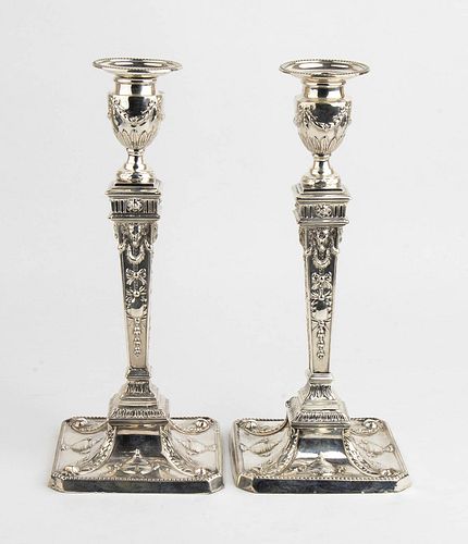 An English pair of sterling silver Victorian candlesticks - London 1894-1895, William Hutton & Sons Ltd