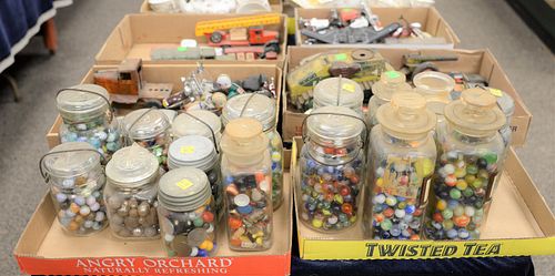 Two tray lots of jars of various marbles in medical glass bottles.