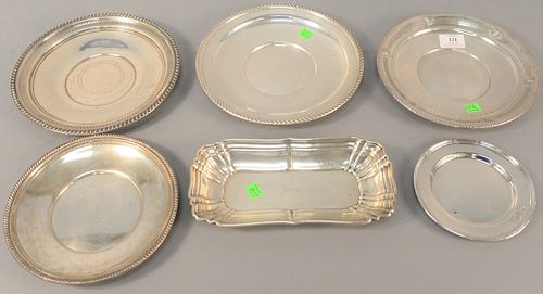 Six-piece lot to include sterling silver, five plates and a dish, lg. 10", 35.4 t.oz. .