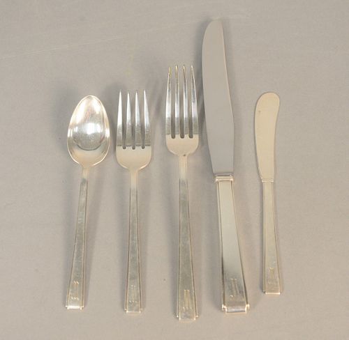 Fifty-five piece sterling silver flatware set to include eight dinner forks, eight luncheon forks, eight butter knives, sixteen teaspoons, six serving