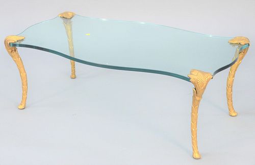 Glass Top coffee table having shaped top and gilded legs, ht. 16 1/2", top 25 1/2" x 47 1/2".