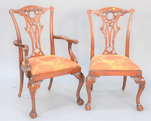 Two Chippendale-style chairs, one with arms, having upholstery seat and ball and claw feet. Estate of Marilyn Ware Strasburg, PA.