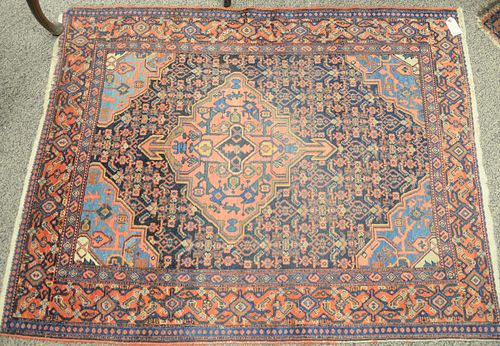 Four Oriental throw rugs, 3' 6" x 4' 6", 2' 8" x 4' 9", 9' x 1' 5" and 2' 2" x 2' 6".