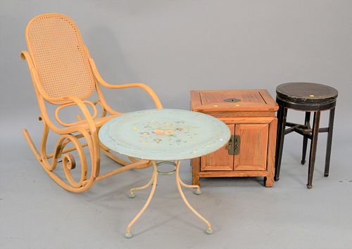 Four-piece lot to include caned rocker, painted table, ht. 20", dia. 28", two-door Chinese cabinet and a round Chinese stand. Estate of Marilyn Ware S