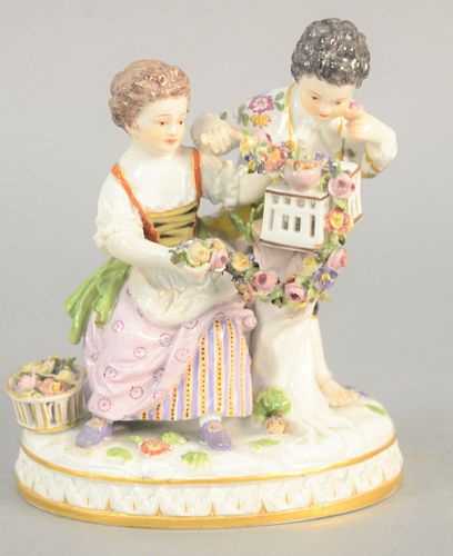 Meissen boy and girl with birdcage, stamped to base, marked with crossed swords, ht. 5 1/2". Provenance: The Estate of Ed Brenner, Short Hills N.J.
