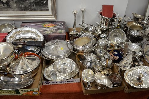 Large lot of silverplate including candlesticks, wine cooler, covered dishes, bowls, liners and a humidor.