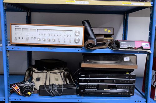 Group of electronics to include Canon FTB camera, Yamaha receiver CR-2020, Nikon camera, Dual 510 record player, two Infinity speakers. Estate of Tom 