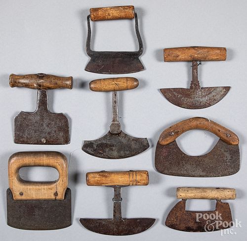 Eight early wood and iron food choppers.