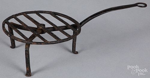 Small wrought iron rotating trivet, 19th c.