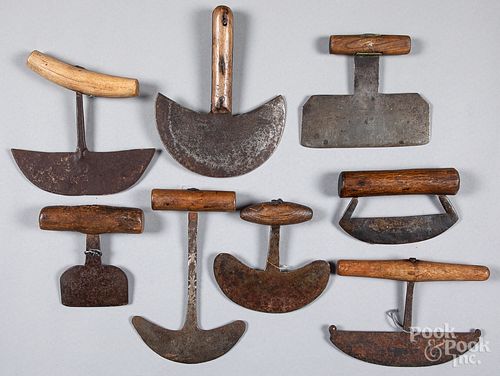 Eight early iron and wood food choppers.