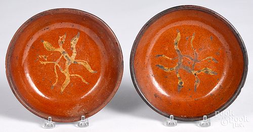 Two Pennsylvania redware shallow bowls, 19th c.