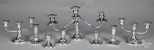 Four pairs of weighted sterling silver candlestic