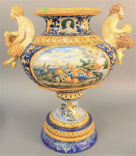 Large Majolica figural urn having mythical faun on each side (repaired), ht. 24", wd. 23".