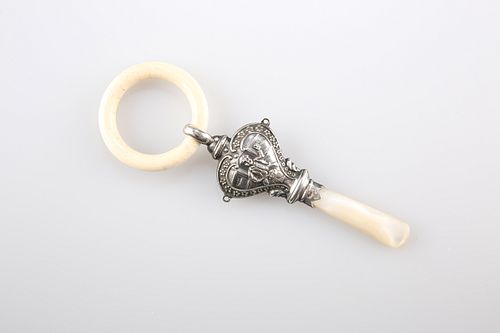 A GEORGE V SILVER AND MOTHER-OF-PEARL "LITTLE JACK HORNER" TEETHER,?by Adie