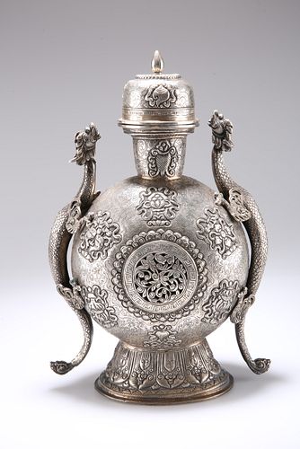A LARGE TIBETAN WHITE-METAL VASE AND COVER, 19TH CENTURY, ovoid form with s