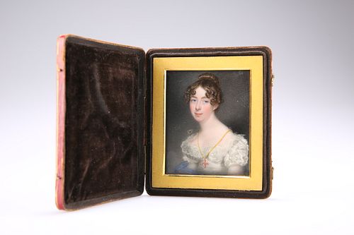 A GEORGE III PORTRAIT MINIATURE, depicting a lady wearing a gold chain with
