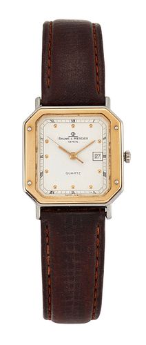 A MID SIZE BAUME & MERCIER WATCH. Rectangular ivory dial with gilt dot mark