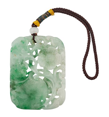 A CHINESE CARVED JADE PENDANT, the rectangular panel carved and pierced wit