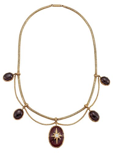 A 19TH CENTURY GARNET AND DIAMOND NECKLACE, the central oval cabochon set w