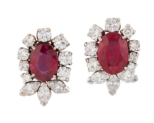 A PAIR OF 18CT WHITE GOLD RUBY AND DIAMOND EARRINGS, the oval rubies in a f