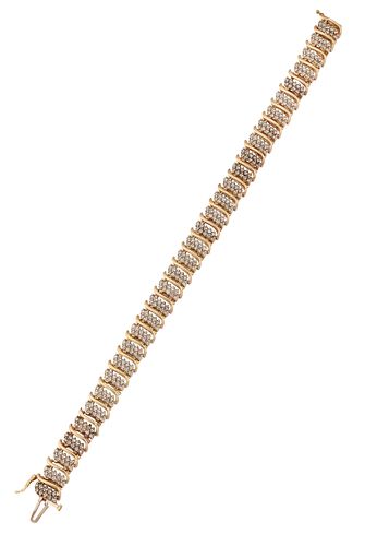 A DIAMOND BRACELET, set with links comprised of two rows of small round bri