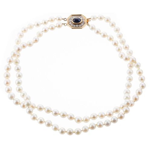 A 14K Pearl Necklace with Diamond & Sapphire Clasp
