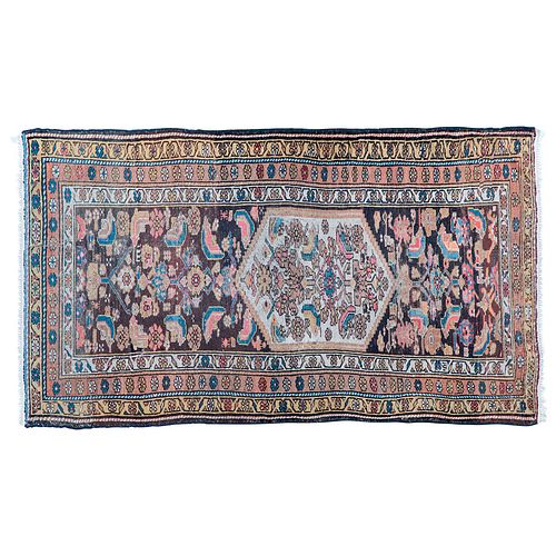 Tapete de pasillo. Pakistán. Siglo XX. Estilo Tabriz. Anudado a mano en fibras de lana. Decorado con medallón central. 107 x 215 cm