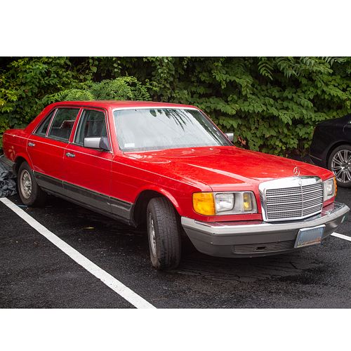 A 1983 Mercedes-Benz Red 380 SEL