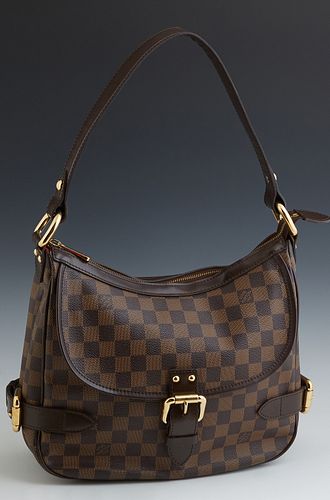 Louis Vuitton Damier Ebene Highbury, in brown and tobacco Louis Vuitton monogram coated canvas, the brass zipper closure opening to...