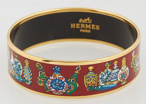 Hermes Wide Bangle Bracelet, with enamel red vase design, stamped "Hermes, Made in Austria" on the interior of the bangle, Dia.- 2 1...