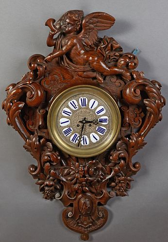 American Short Drop Carved Mahogany Octagonal Schoolhouse Clock, 19th c., time and strike, with an eglomise window drop, with pendul...