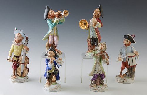 Six Piece Dresden Polychromed Porcelain Monkey Band, 20th c., the underside with a yellow crown over the word "Dresden," H.- 6 in., W.- 2 in., D.- 2 i