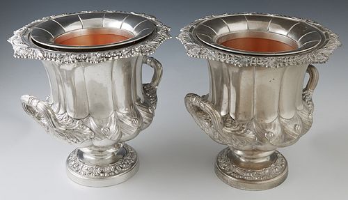 Pair of Japanese Silvered Metal Wine Coolers, 20th c., with scalloped rims and gilt interiors, of handled baluster form, H.- 8 1/4 in., Dia.- 9 in. Pr