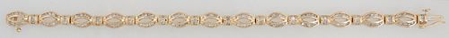 14K Yellow Gold Link Bracelet, each of the 13 oval pierced diamond mounted links joined by an arched link with two round diamonds, total diamond wt.- 